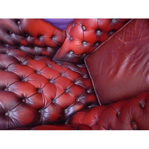 431 - PAIR OF BURGUNDY LEATHER CHESTERFIELD STYLE WING ARMCHAIRS - BUTTON BACKED - WEAR TO ARMS AND SEAT C... 