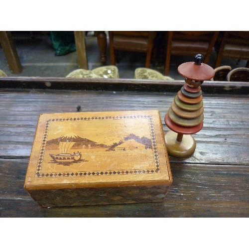 53B - A JAPANESE MARQUETRY PUZZLE BOX, AN ANTIMONY BOX WITH A PEACOCK DESIGN AND A WOODEN DISC DOLL