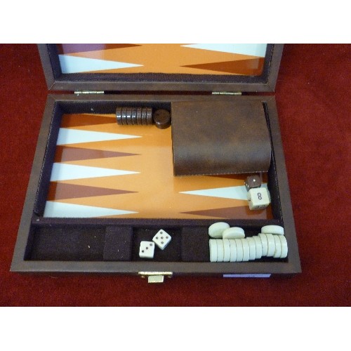 72 - BACKGAMMON SET IN SMALL LEATHERETTE CASE.