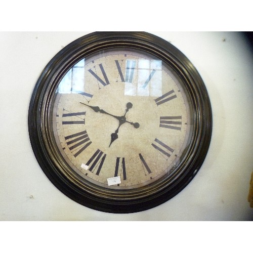 121 - WALL CLOCK WITH 'ANTIQUED FACE' AND ROMAN NUMERALS.