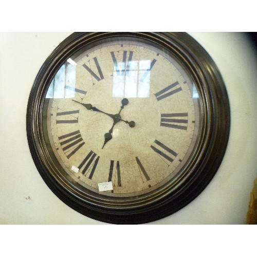 121 - WALL CLOCK WITH 'ANTIQUED FACE' AND ROMAN NUMERALS.