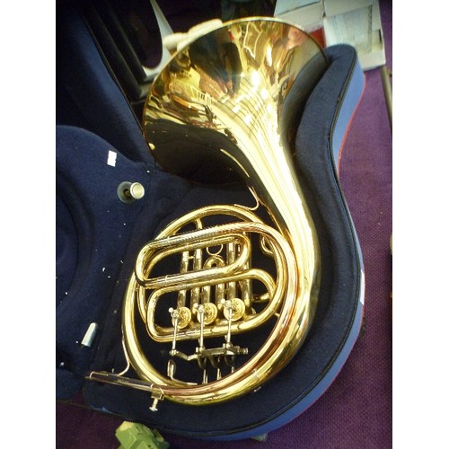 134 - FRENCH HORN 'THE HORNBLOWER 161' BRASS INSTRUMENT IN PROTECTIVE PADDED CASE.