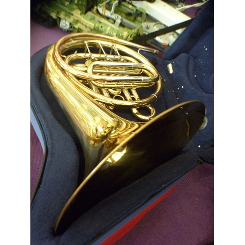 134 - FRENCH HORN 'THE HORNBLOWER 161' BRASS INSTRUMENT IN PROTECTIVE PADDED CASE.