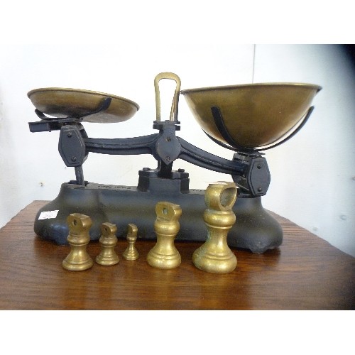 140 - VINTAGE WEIGH SCALES, COMPLETE WITH BRASS SCOOPS AND A SET OF IMPERIAL BELL WEIGHTS.