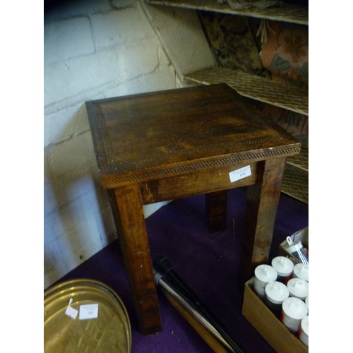 159 - SMALL HEAVY SQUARE SIDE/OCCASIONAL TABLE. DARK WOOD, VERY SOLID WITH CARVED EDGE AND LEGS.