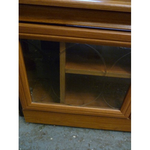 334 - TV UNIT, WITH GLASS DOORS. TEAK COLOUR. 82CM W.