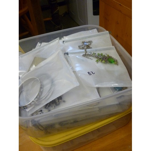 321 - LARGE QUANTITY OF COSTUME JEWELLERY, CONTAINED IN 3 LARGE LIDDED TUBS. ALL APPEAR PACKAGED SEPARATEL... 