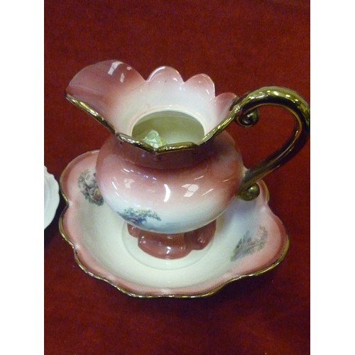 305 - 2 X SMALL JUG & BOWL SETS. A DEEP PINK ONE DECORATED WITH ROMANTIC COUPLE, BOWL IS FULL OF POT-POURR... 