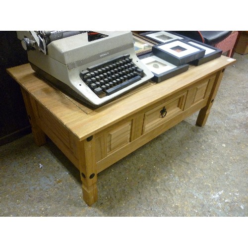 376A - LARGE THAKAT STYLE COFFEE TABLE. CHUNKY BOLTS. 100CM L. SMALL STORAGE DRAWER WITH METAL PULL HANDLE.