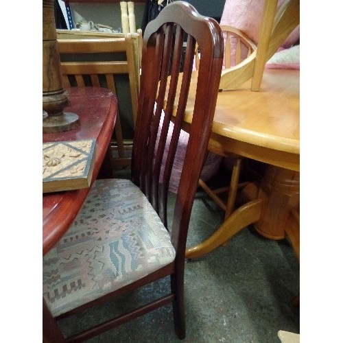 389 - MAHOGANY COLOURED EXTENDING DINING TABLE AND 2 CHAIRS.