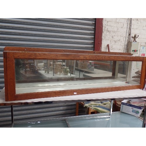 254 - VINTAGE OAK FRAMED MIRROR BACKED SHOP CABINET - 122CM, LONG