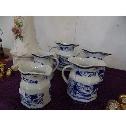 81 - 5 X GRADUATED BLUE AND WHITE MILK JUGS 