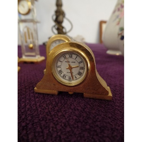 80 - COLLECTION OF 9 MINIATURE GILT CLOCKS INC ANNIVERSARY CLOCK, MANTEL CLOCK, BALLOON CLOCK , LONGCASE ... 