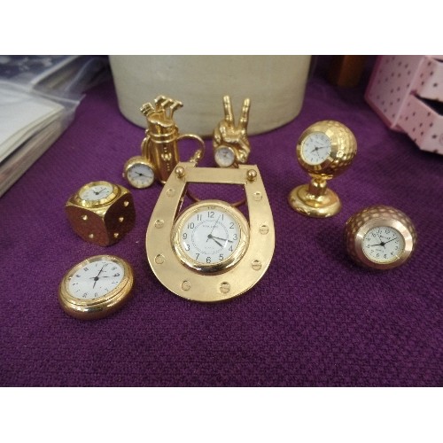 73 - COLLECTION OF 7 GOLD PLATED NOVELTY MINIATURE CLOCKS ON A SPORTING THEME - GOLF, EQUESTRIAN, VICTORY... 