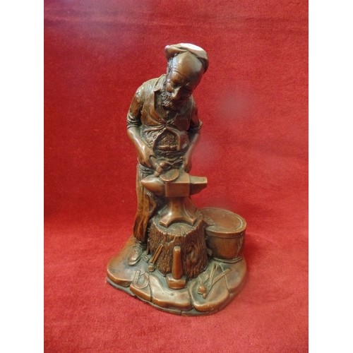 85 - A CARVED WOOD AFRICAN HEAD DISH /ASHTRAY TOGETHER WITH A FIGURE OF A BLACKSMITH AND A FOAL