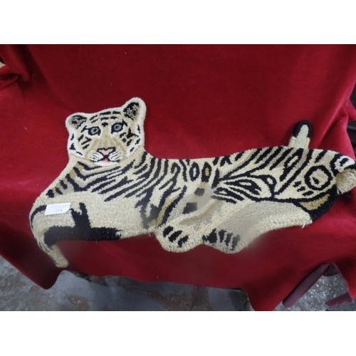 218 - WOOL TIGER RUG, LEOPARD PRINT FOLDER AND CUSHION, DOG MOBILE, DOG BAG AND FUR CAMEL