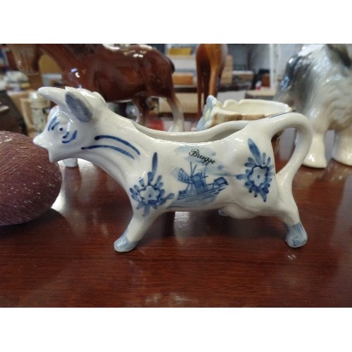 243 - COLLECTION OF MOSTLY CERAMIC ANIMALS INC KINGSTON POTTERY OLD ENGLISH SHEEPDOGS, DELFT COW CREAMER, ... 