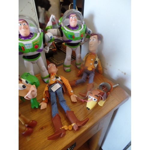 317 - SELECTION OF  TOY STORY FIGURES - 2 BUZZ LIGHTYEARS, 2  WOODIES, 2 HOURSES AND DOG