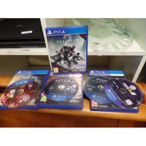 148 - PLAYSTATION 4 UNIT AND 4 GAMES INC DESTINY 2, SKYRIM ETC