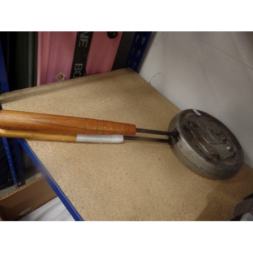 439 - CAST IRON AND WOODEN HANDLED WAFFLE IRON