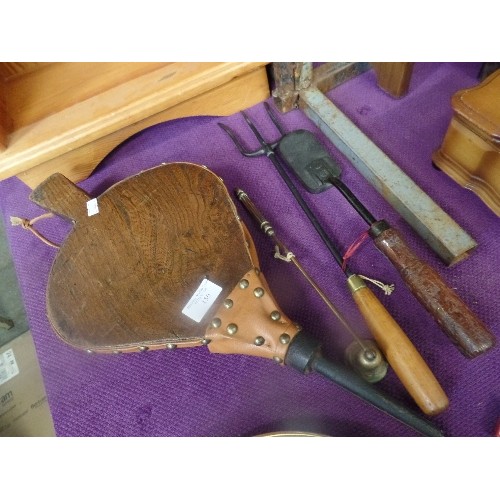 150 - A PAIR OF BELLOWS, IN GWO, A CANDLE SNUFFER, AND 2 FIRE COMPANION TOOLS.