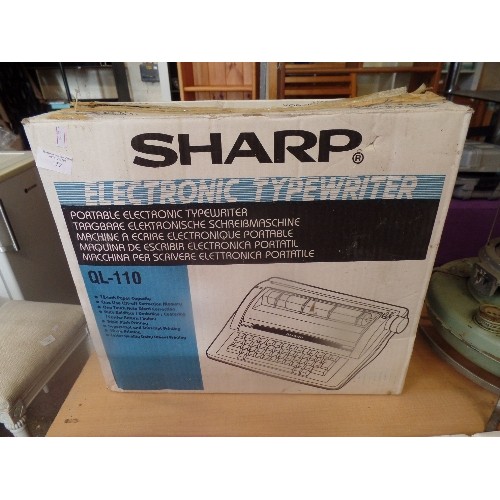 152 - SHARP PORTABLE ELECTRONIC TYPEWRITER. QL-110.BOXED.