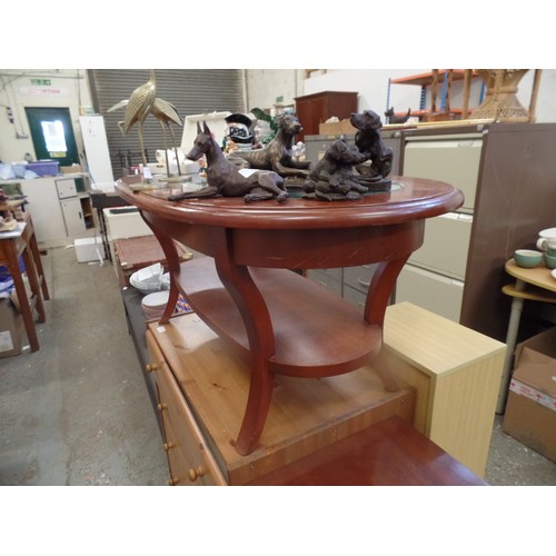 249 - OVAL COFFEE TABLE WITH BEVELLED GLASS INSERT AND LOWER SHELF. 110CM L