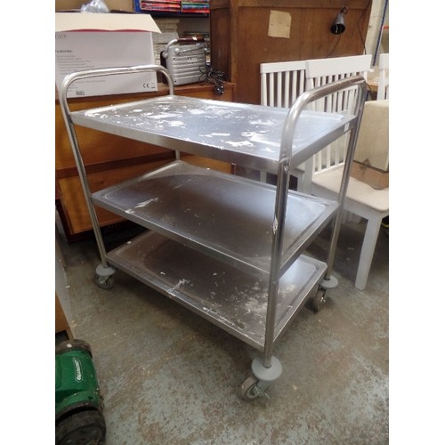 310 - LARGE STAINLESS STEEL CATERING TROLLEY ON CASTORS. 3 LEVELS-EACH TRAY APPROX 83CM L. NEEDS A CLEAN A... 