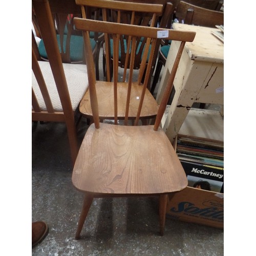 349 - A PAIR OF RETRO ERCOL STICK BACK KITCHEN CHAIRS. PAPER LABELS ON SEAT BACK.