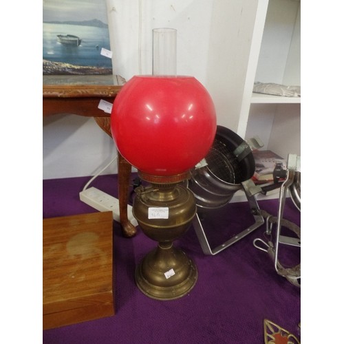 96A - BRASS DOUBLE BURNER OIL LAMP WITH BRIGHT RED SHADE AND CLEAR CHIMNEY