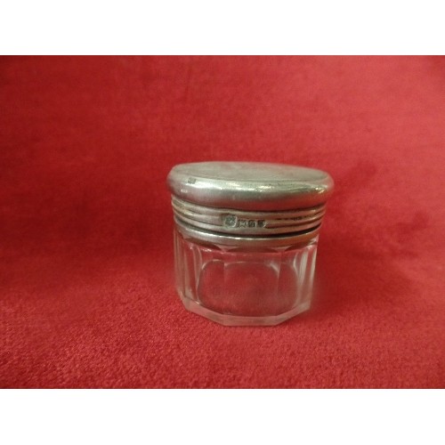 29 - THREE VICTORIAN AND LATER  SILVER TOPPED PANEL CUT DRESSING TABLE JARS, LONDON HALLMARKS, 1899, 1934... 