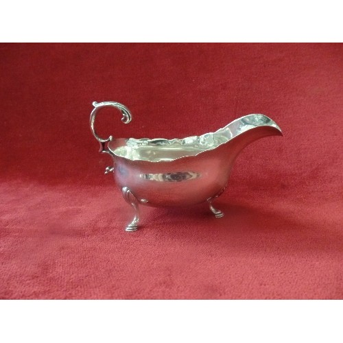 17 - A GEORGIAN STERLING SILVER SAUCE BOAT BY WILLIAM SKEEN, LONDON, 1785. SOME DAMAGE (DENTS AND SMALL S... 