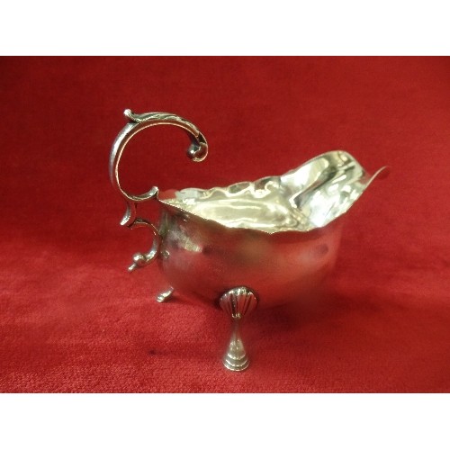 17 - A GEORGIAN STERLING SILVER SAUCE BOAT BY WILLIAM SKEEN, LONDON, 1785. SOME DAMAGE (DENTS AND SMALL S... 