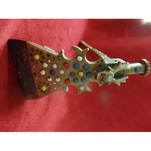 70 - A TIBETAN CEREMONIAL AXE IN BRASS WITH STEEL BLADE, INLAID WITH COLOURED BEADS - PROBABLY FIRST HALF... 