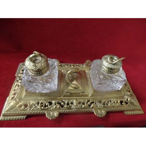 24 - A SUPERB BRASS DESK STAND WITH HEAVY GLASS INKWELLS MOUNTED WITH SNAKES. A HINGED STAMP BOX IN THE C... 