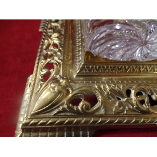 24 - A SUPERB BRASS DESK STAND WITH HEAVY GLASS INKWELLS MOUNTED WITH SNAKES. A HINGED STAMP BOX IN THE C... 