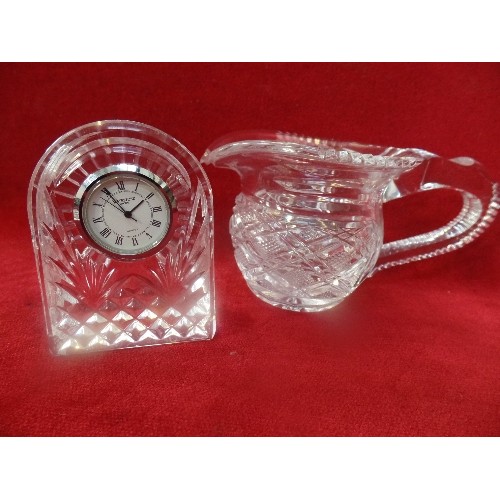 287 - FOUR PIECES OF WATERFORD CRYSTAL INCLUDING TWO BOWLS, A CREAM JUG AND A CLOCK - ALL MARKED