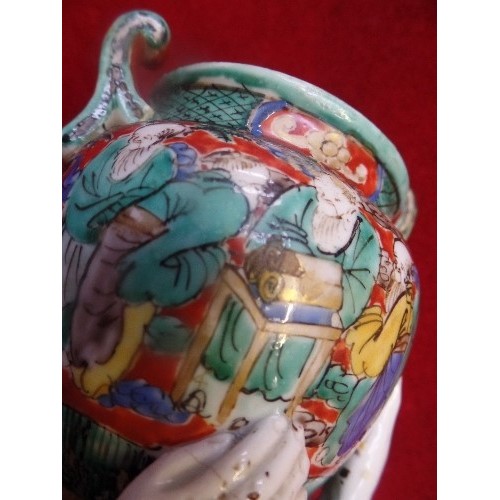 137 - AN UNUSUAL MID 20TH CENTURY CHINESE PORCELAIN VASE IN THE FORM OF A GIRL HOLDING ALOFT AN URN WHICH ... 