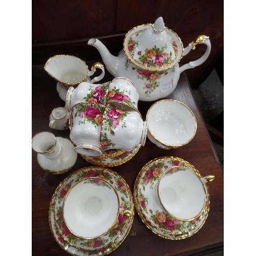 234A - A ROYAL ALBERT OLD COUNTRY ROSES TEA SERVICE INCLUDING TEAPOT, MILK, SUGAR, 6 CUPS, SAUCERS AND SIDE... 