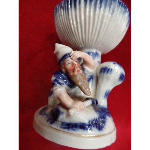 184 - A MOST UNUSUAL 19TH CENTURY GERMAN PORCELAIN TABLE SALT IN THE FORM OF A GNOME MINER WITH TOADSTOOLS... 