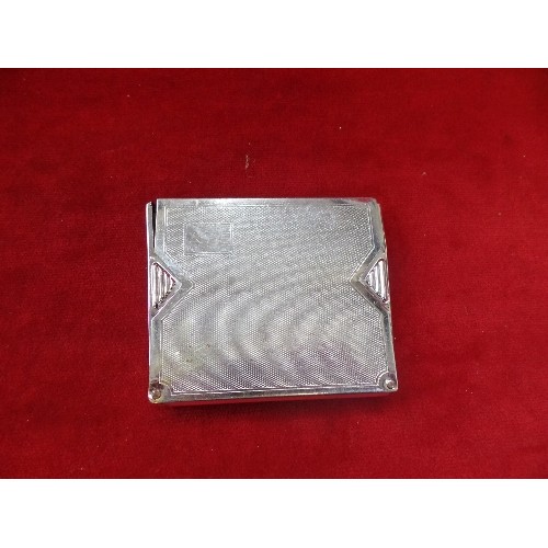 77B - AN UNUSUAL ART DECO CHROME PLATED CIGARETTE CASE - ENGINE TURNED DESIGN, THE SIDES SWING OUT FROM HI... 