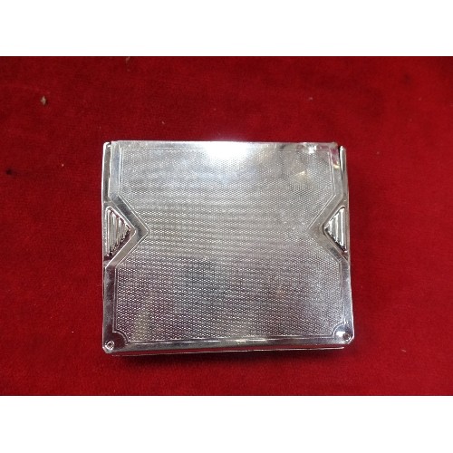 77B - AN UNUSUAL ART DECO CHROME PLATED CIGARETTE CASE - ENGINE TURNED DESIGN, THE SIDES SWING OUT FROM HI... 