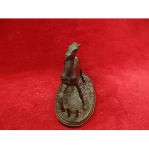 130 - 19TH CENTURY SPELTER FIGURE OF A STARTLED HORSE AT A FENCE,  ON AN OVAL BASE - 14CM X 12CM H