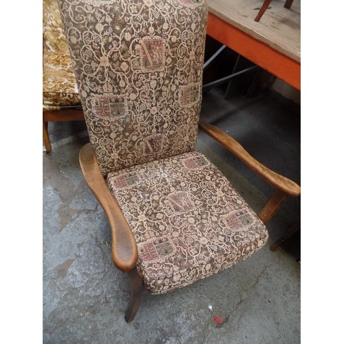 259B - A MID CENTURY WOODEN FRAMED ARMCHAIR WITH SPRUNG SEAT