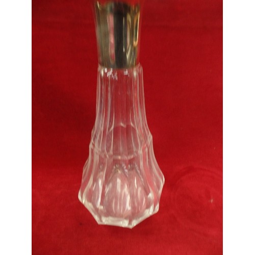 23 - A CIRCA 1930'S HEAVY CUT GLASS DECANTER WITH SILVER PLATED COLLAR MARKED WMF