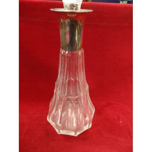 23 - A CIRCA 1930'S HEAVY CUT GLASS DECANTER WITH SILVER PLATED COLLAR MARKED WMF