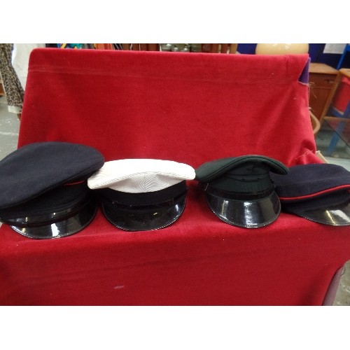 90B - 4 X VINTAGE MILITARY DRESS HATS. 2 ARE NAVY/BLACK WITH RED PIPING, A DARK GREEN, AND A WHITE WITH BL... 