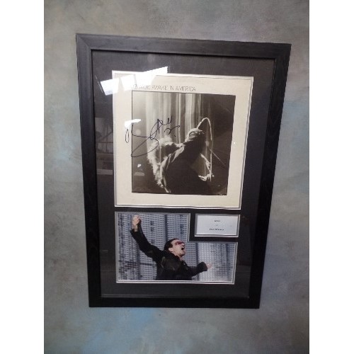 319F - U2. BONO/PAUL HEWSON INTEREST. SIGNED & FRAMED 'WIDE AWAKE IN AMERICA' PHOTOGRAPHS X 2 OF BONO ON ST... 