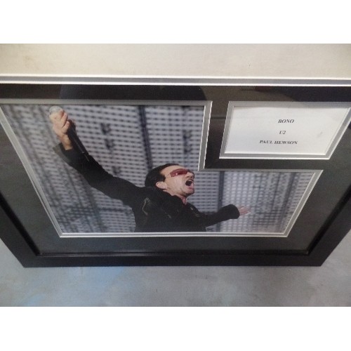 319F - U2. BONO/PAUL HEWSON INTEREST. SIGNED & FRAMED 'WIDE AWAKE IN AMERICA' PHOTOGRAPHS X 2 OF BONO ON ST... 