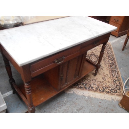 446 - EDWARDIAN AMERICAN WALNUT WASH STAND. WITH MARBLE TOP. 2 DRAWERS AND CENTRAL CUPBOARD. 107CM W.